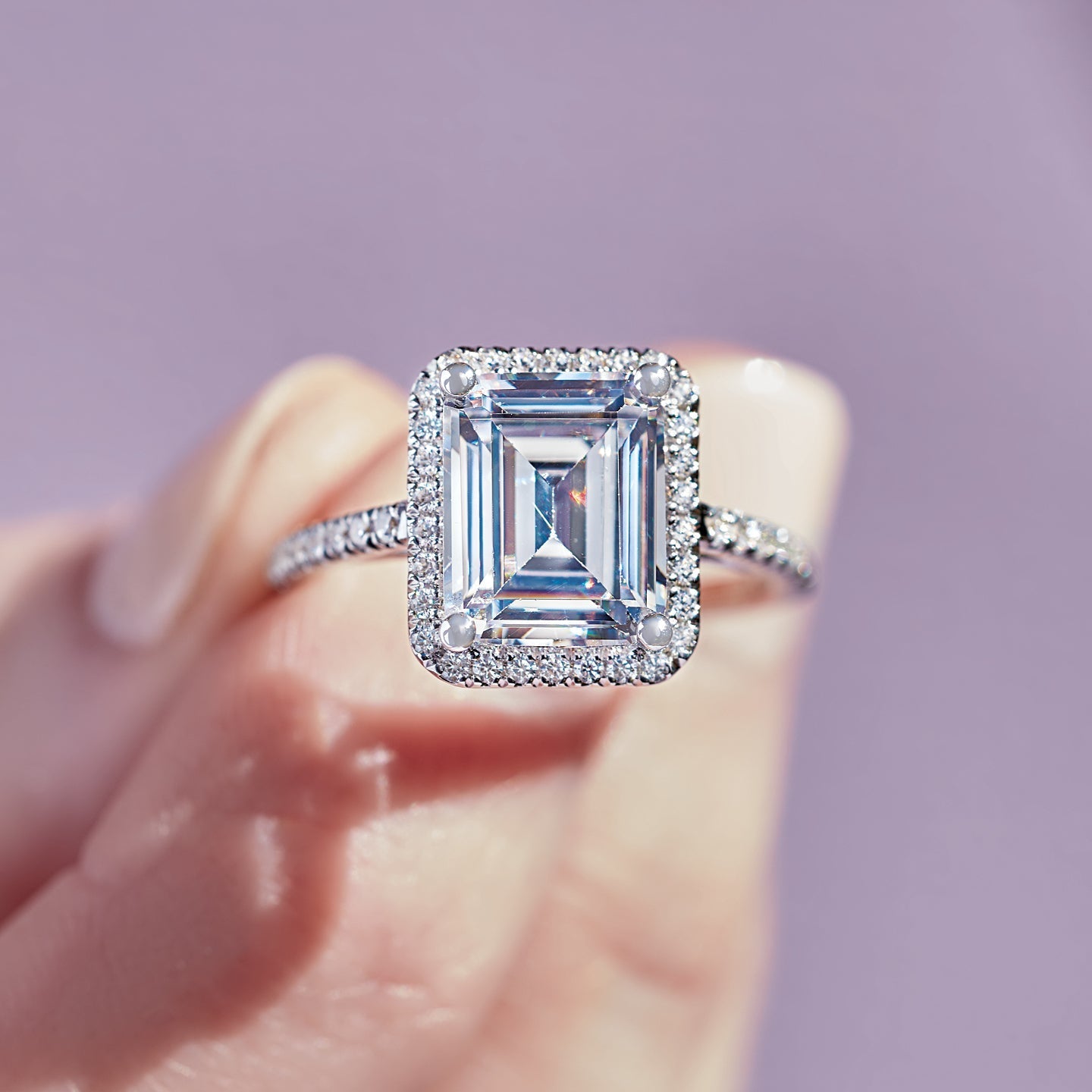 Beautiful emerald cut engagement ring in white gold