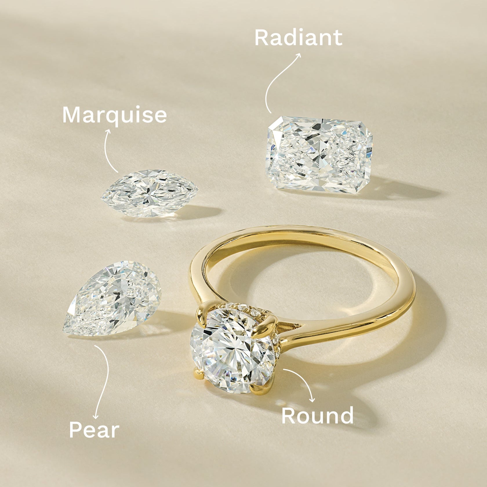 Different shape diamonds for yellow gold engagement ring