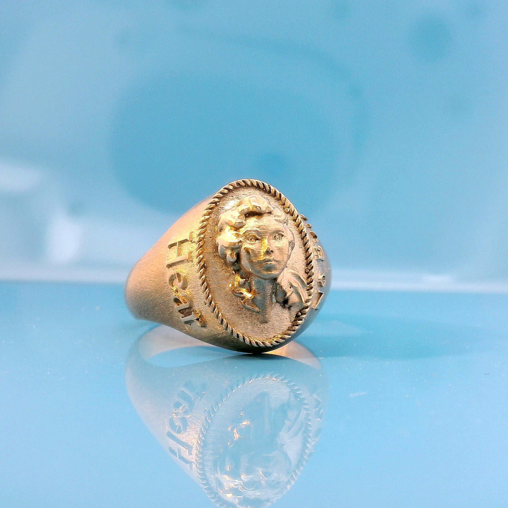 Handcrafted custom cast signet ring in gold