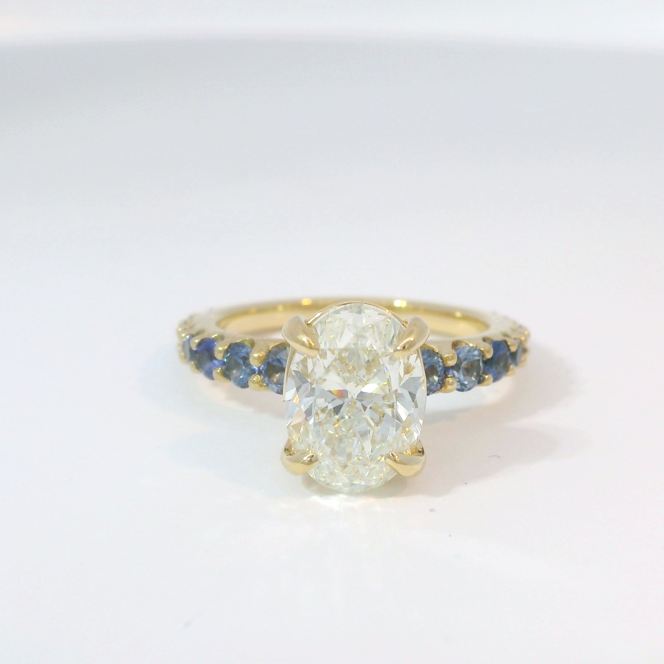 Custom diamond and sapphire engagement ring