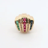 Gold pendant with colorful gemstones on a white background